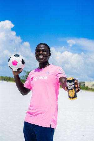 liquid death, siesta key beach shoot, sphere collab, sphere soccer, soccer and fitness