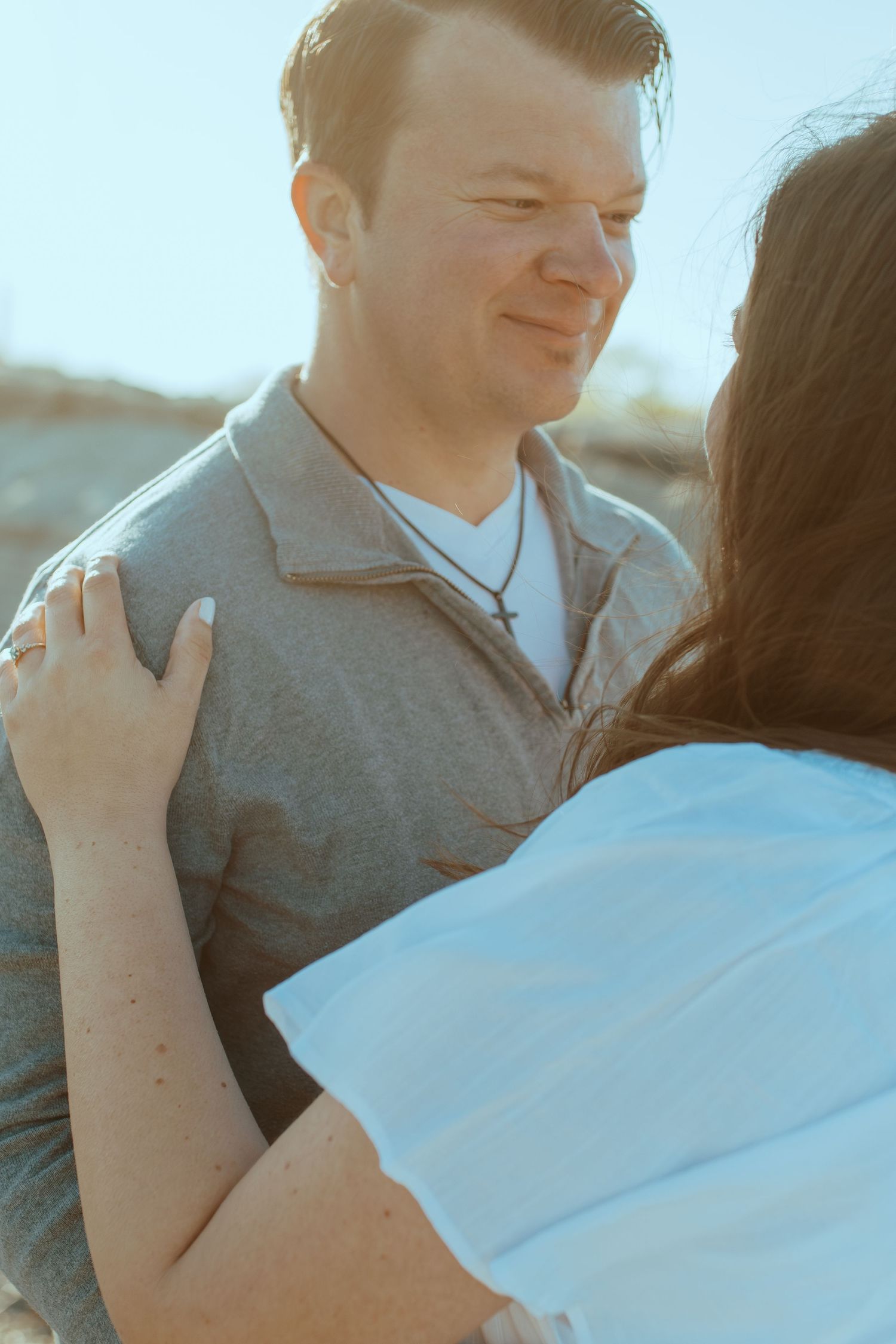 An intimate close-up shot of a couple sharing a tender and affectionate moment together.