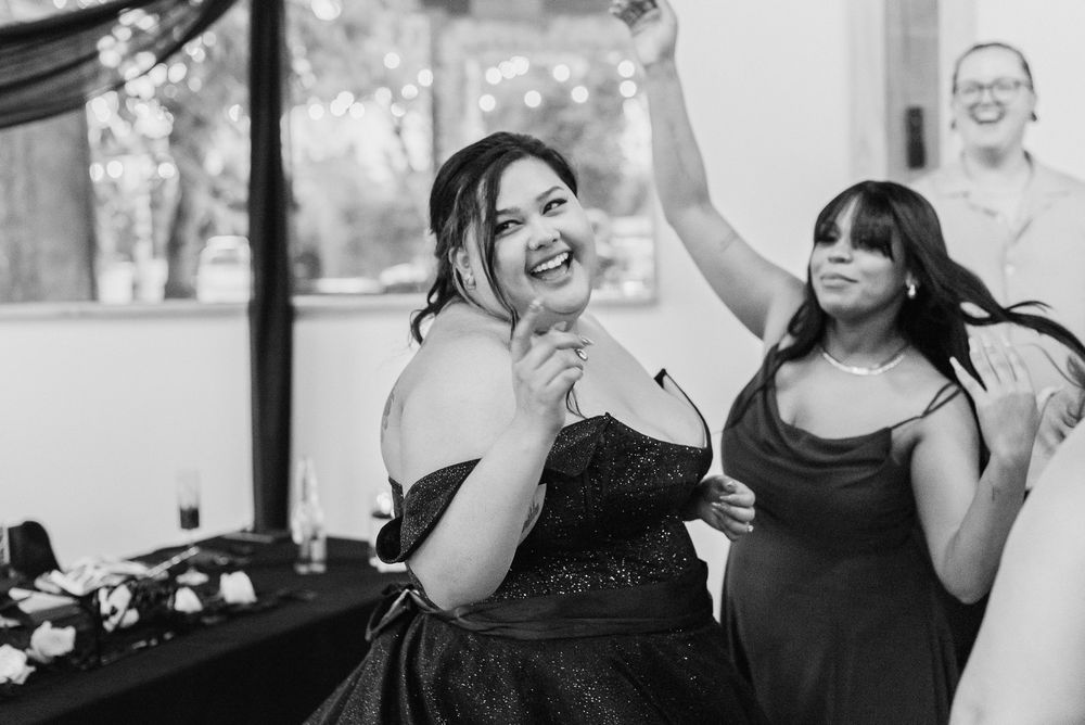 Black and white photos of wedding guests enjoying themselves and laughing during celebrations.