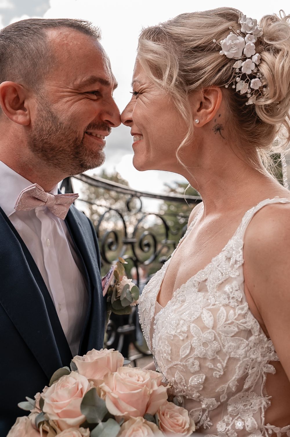 A romantic wedding couple shares intimate moments in a series of candid photos showing their joy and affection.
