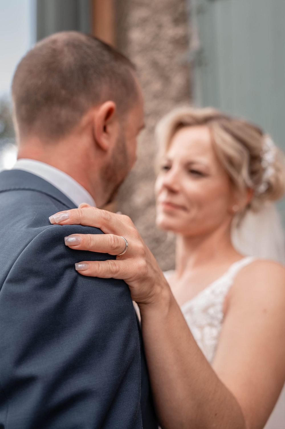 A romantic wedding couple dancing together in an intimate moment captured in a series of close-up shots.