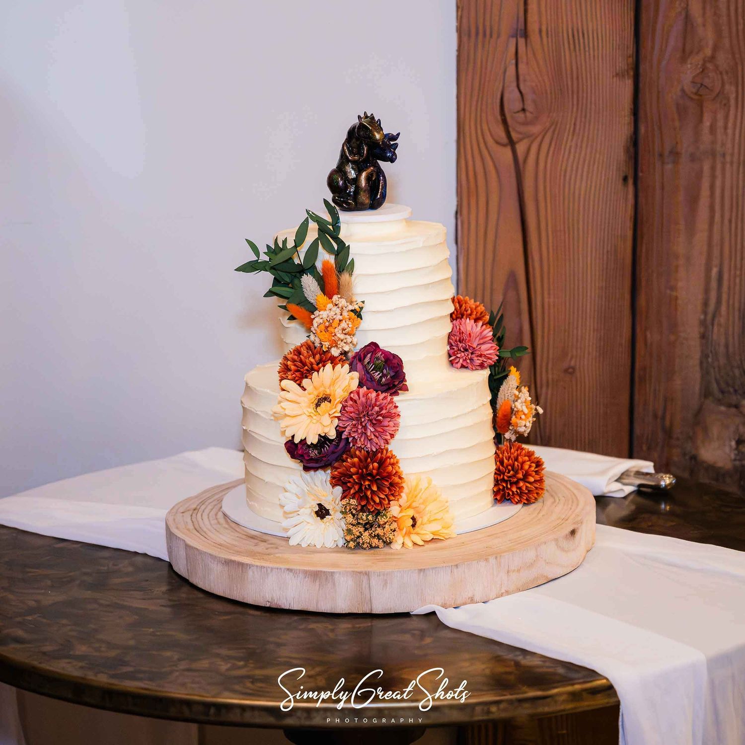Ornate wedding cake at Crows Nest Barton Marina