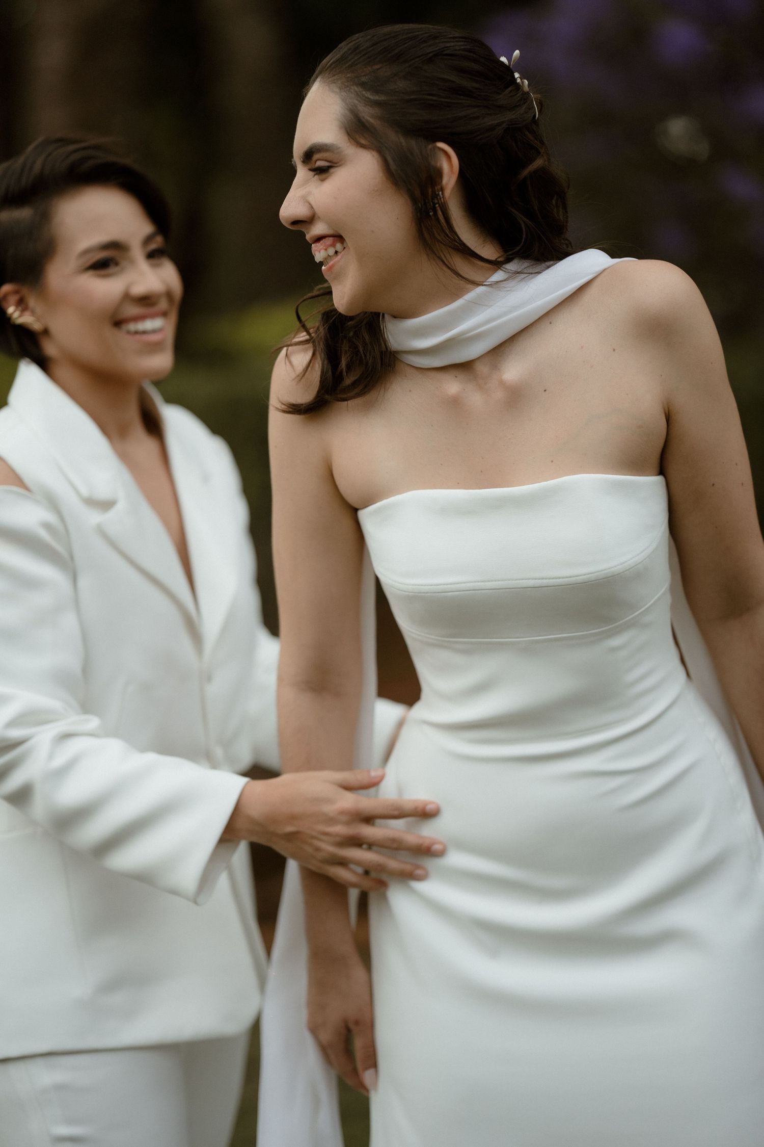 A series of intimate wedding photos showing two people in white attire sharing joyful moments together outdoors.