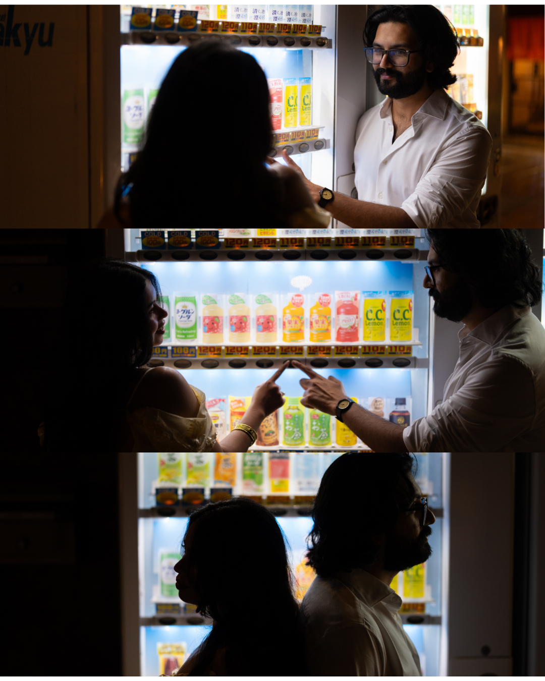 Couple selecting drinks from a colorful Japanese vending machine in a dark setting.
