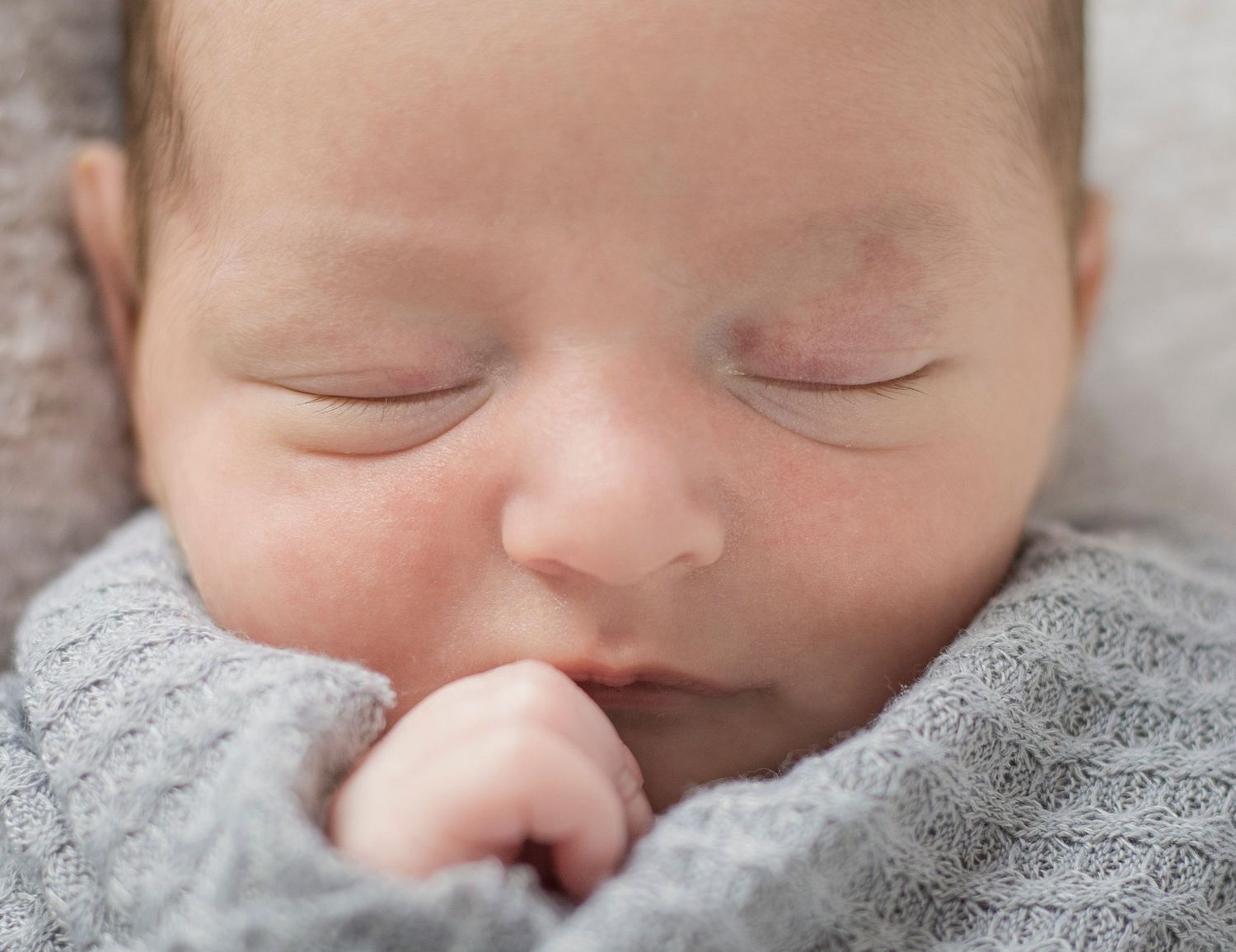 Sleeping baby, close up portrait of face.