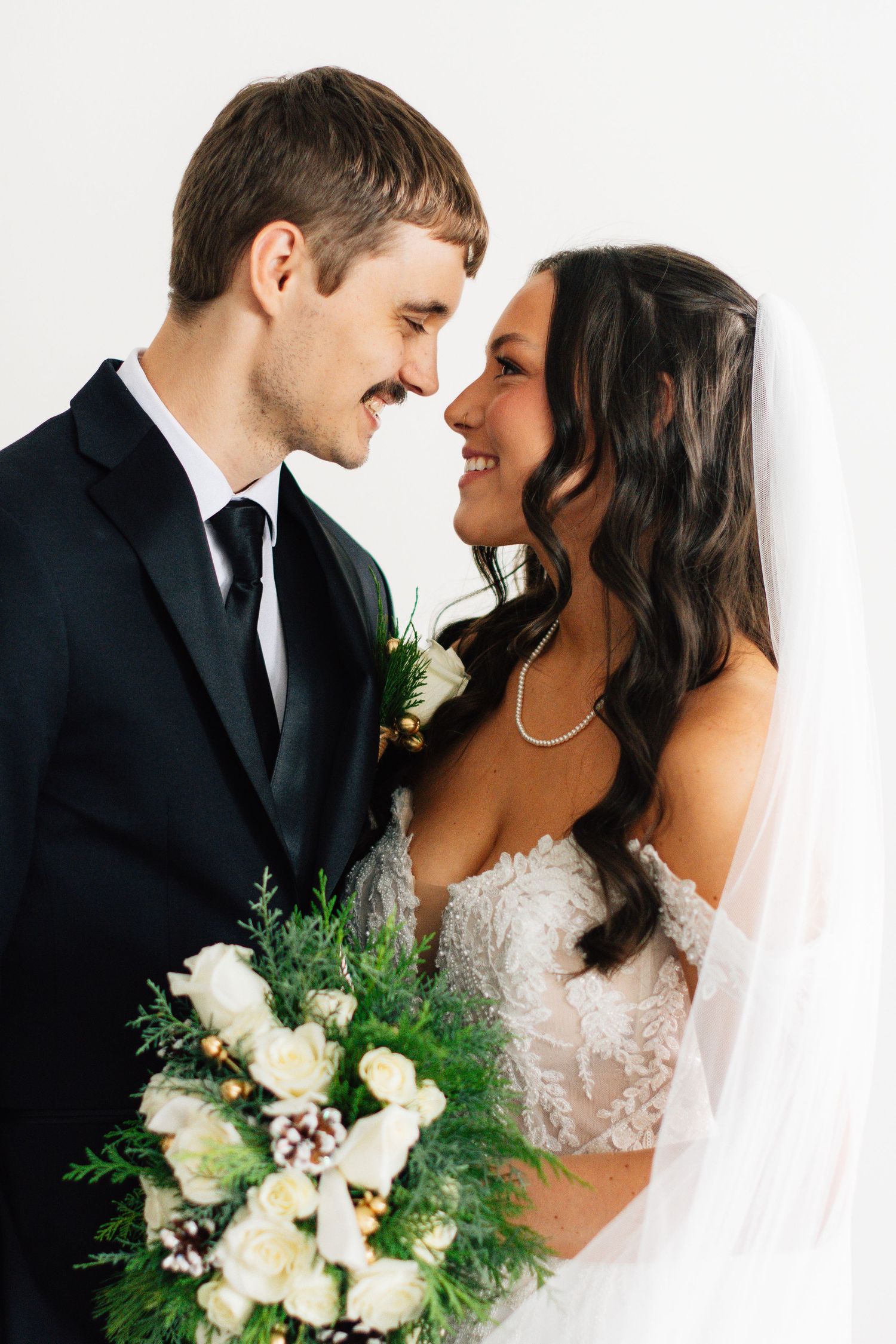 Romantic wedding portrait series against white background with floral bouquet details.