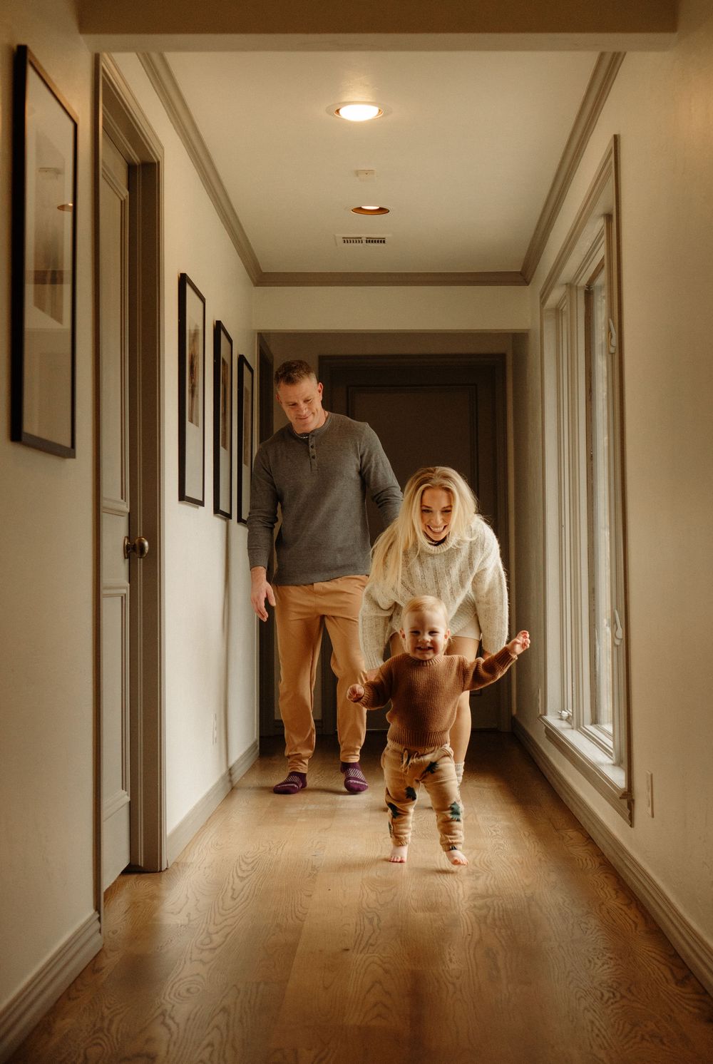 A sequence of photos showing someone walking down a long hallway with hardwood floors and white walls.
