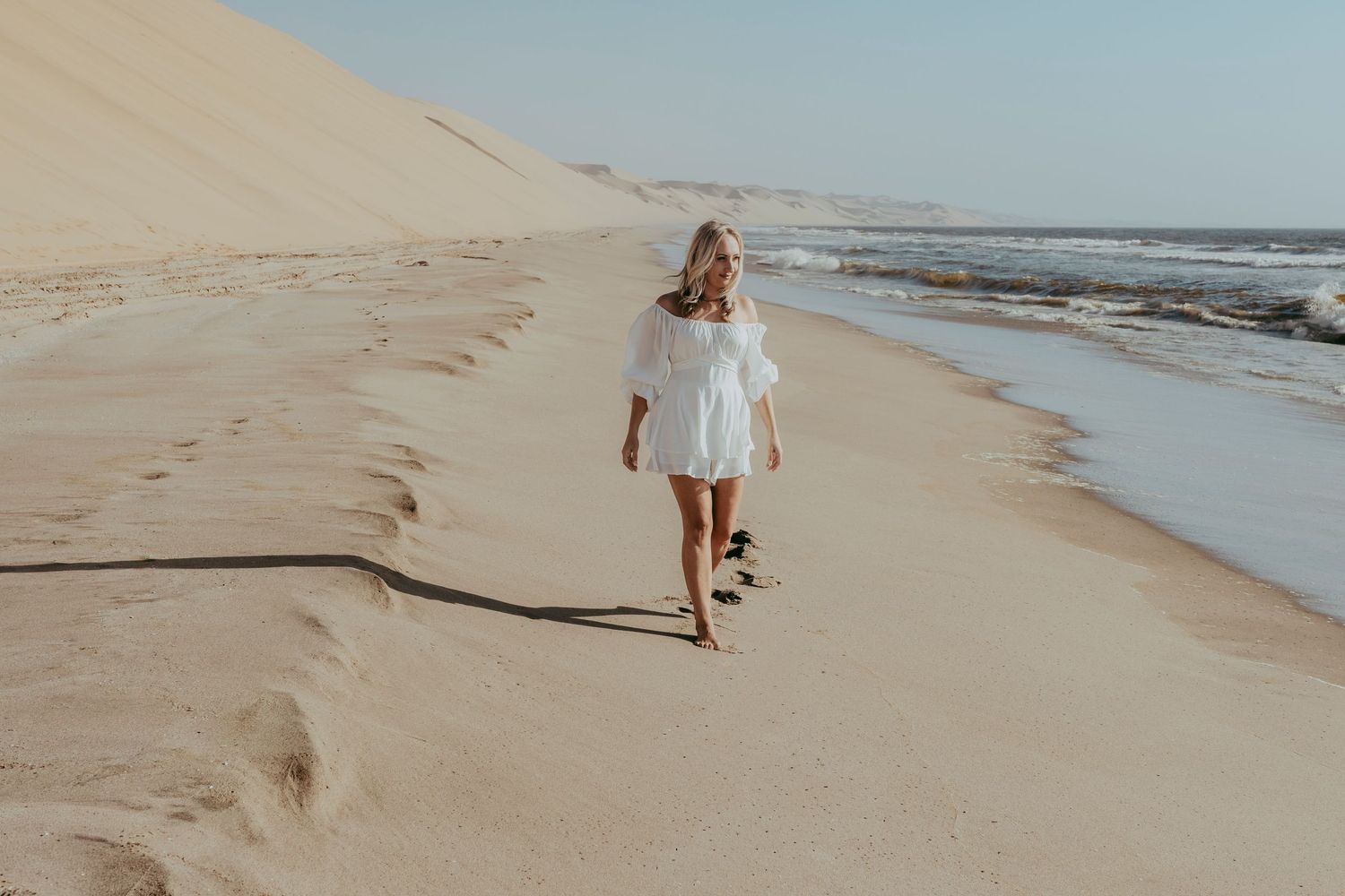 Sandwich Harbour tour where dunes meet the ocean luxury photoshoot
