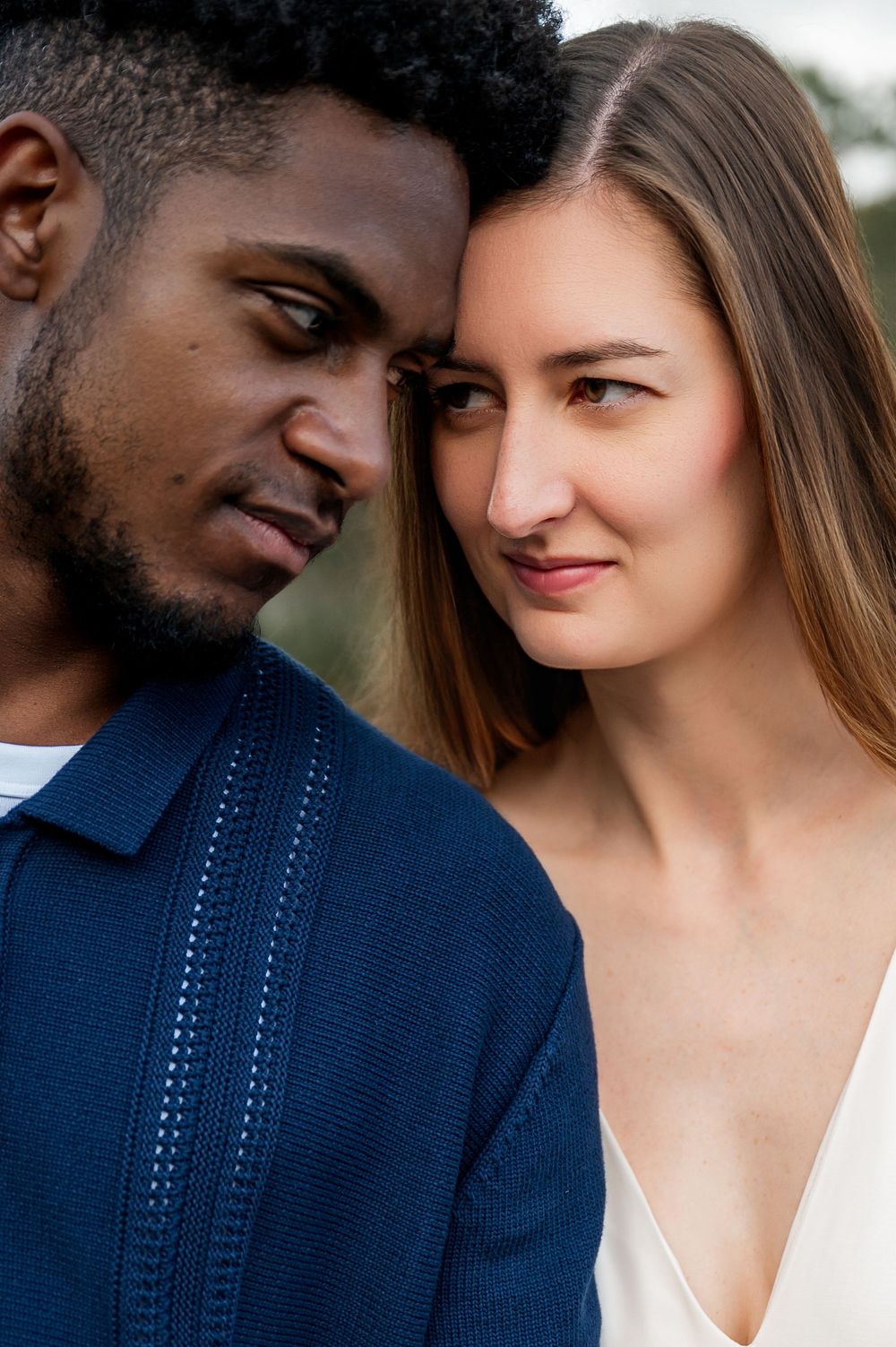 Series of intimate close-up shots showing couple's emotional connection.
