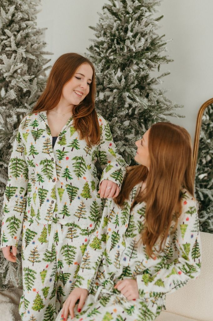 A series of cozy winter photos showing matching botanical print pajamas against a snowy decorated Christmas tree background.