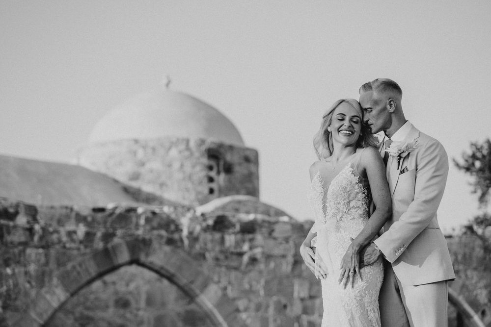 A collection of vintage black and white wedding photographs arranged in a horizontal row showing romantic moments.