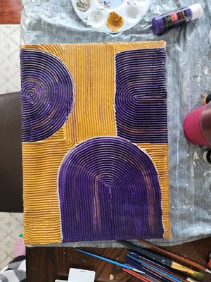 Abstract geometric painting with purple circular patterns against yellow stripes on canvas.