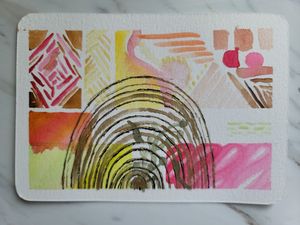 Abstract watercolor with geometric shapes and concentric circles in warm yellow, pink and orange tones.