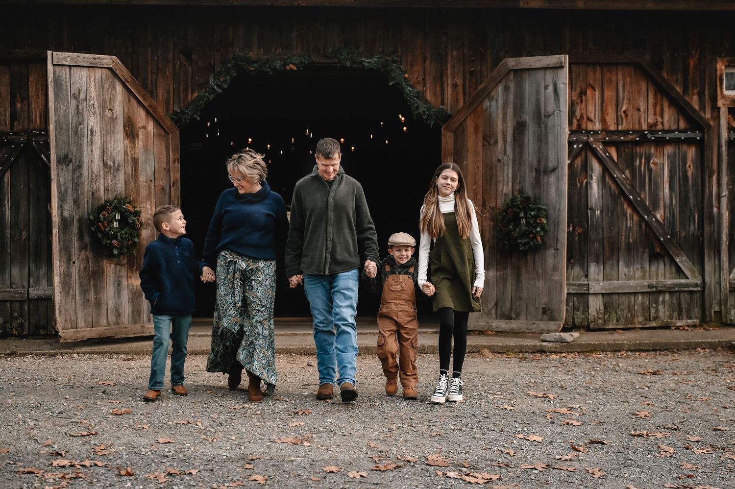 Worcester family photographer capturing a family walking outside.