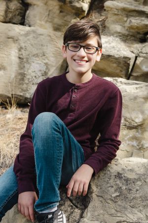 The Cox family shares smiles and sweet moments during a joyful photo session, capturing love, laughter, and togetherness.