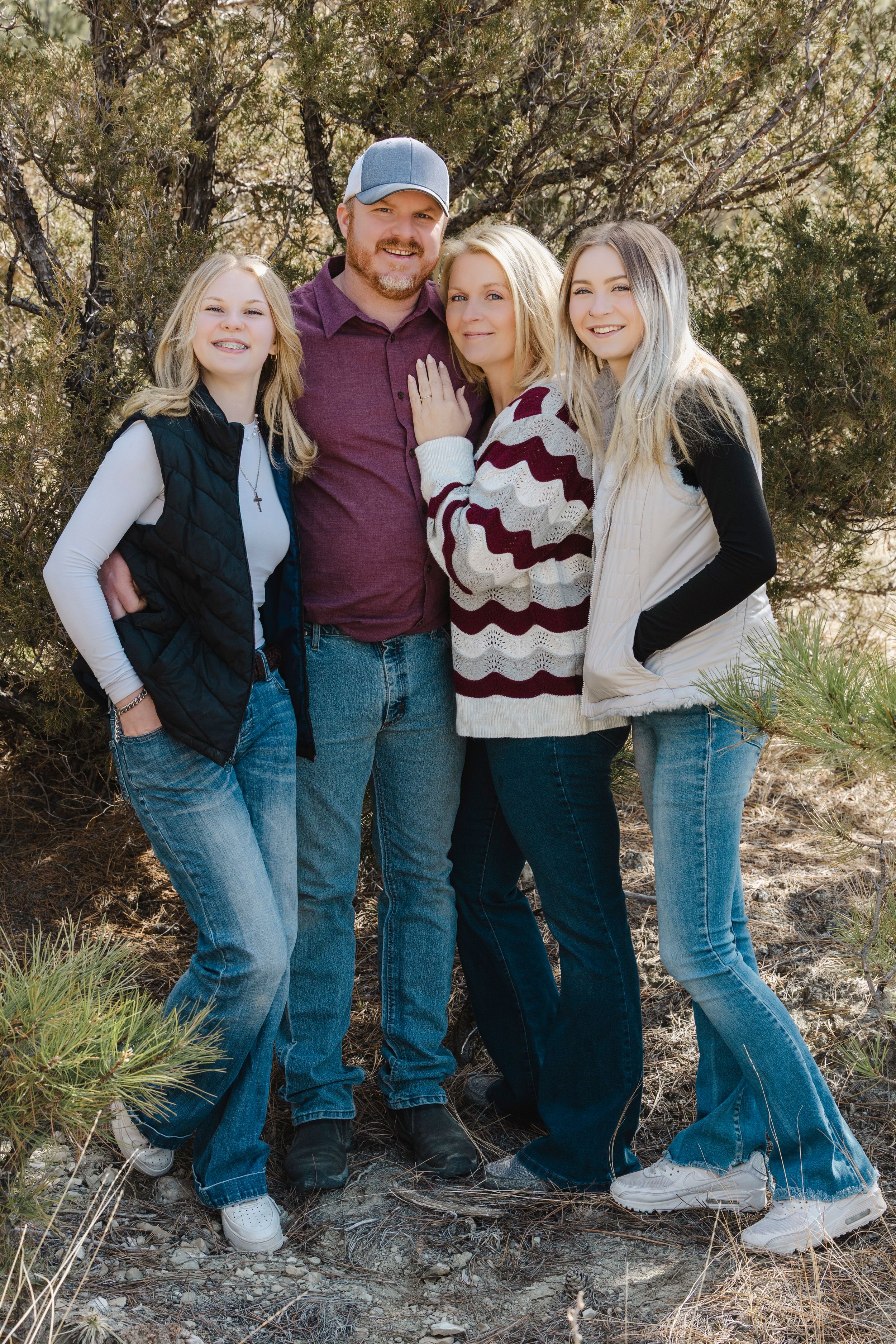 The Acords share smiles and sweet moments during a joyful photo session, capturing love, laughter, and their special bond.