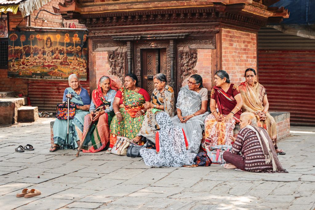 lndian ladies in colourful saris. Street photography in Nepal by Emma Drohan
Colorful scene Nepal travel series