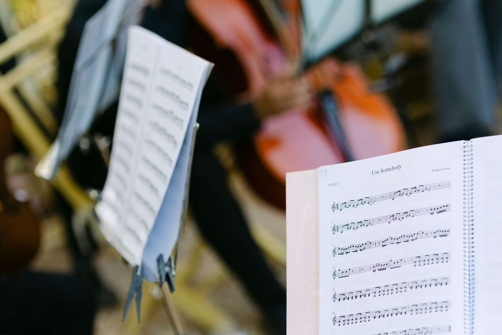 String quartet playing live music during outdoor wedding ceremony in Lisbon Portugal