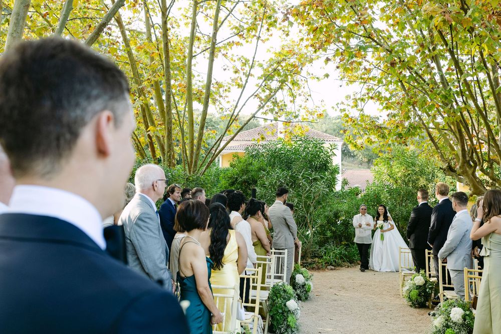 Emotional moment as groom greets bride at ceremony aisle in Lisbon destination wedding