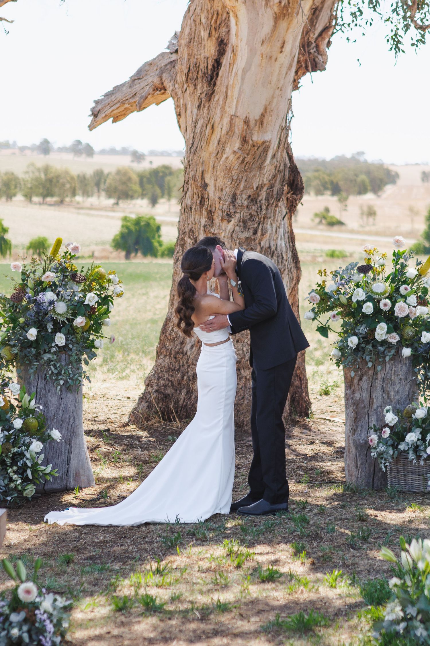 Bride and groom during their first kiss at country NSW wedding