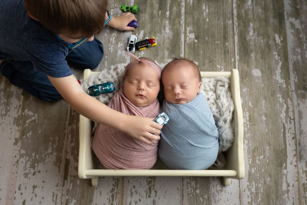 Twin newborns with big brother, taken by Jen Knightstep, Photographer
