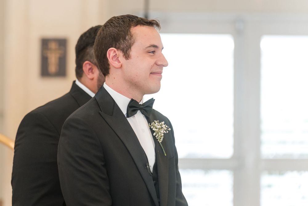 Groom smiling while waiting at altar during ceremony at Stella Maris Church Puerto Rico