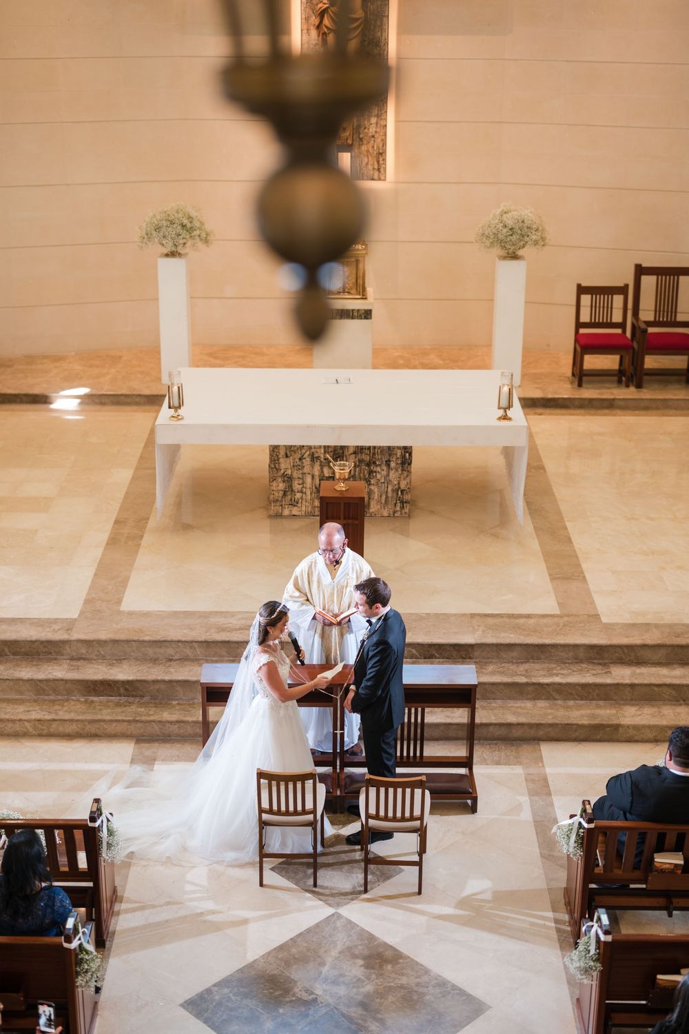 Bride and groom standing at altar during ceremony at Stella Maris Church Puerto Rico