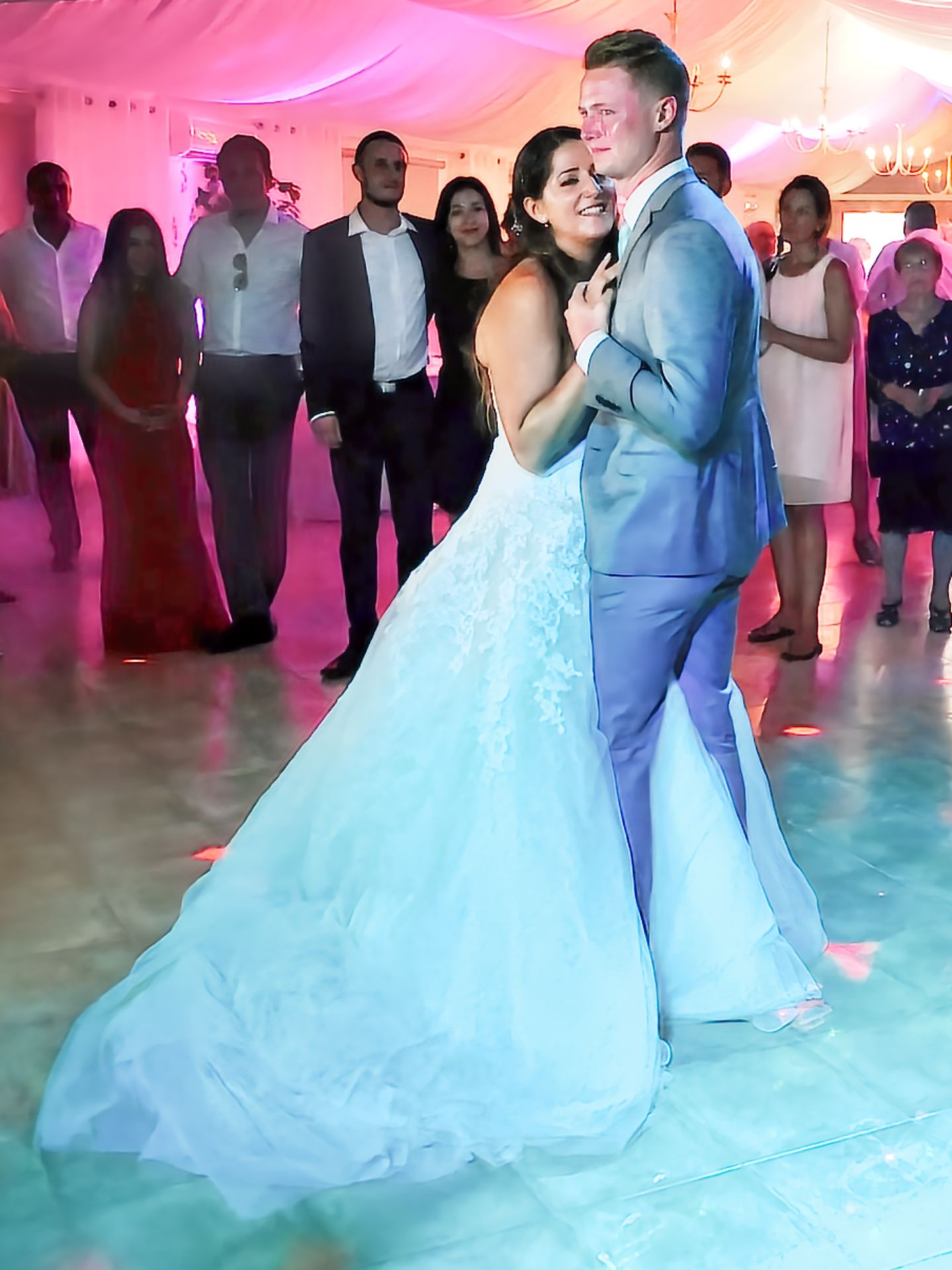 First dance of the newlyweds in a romantic setting.