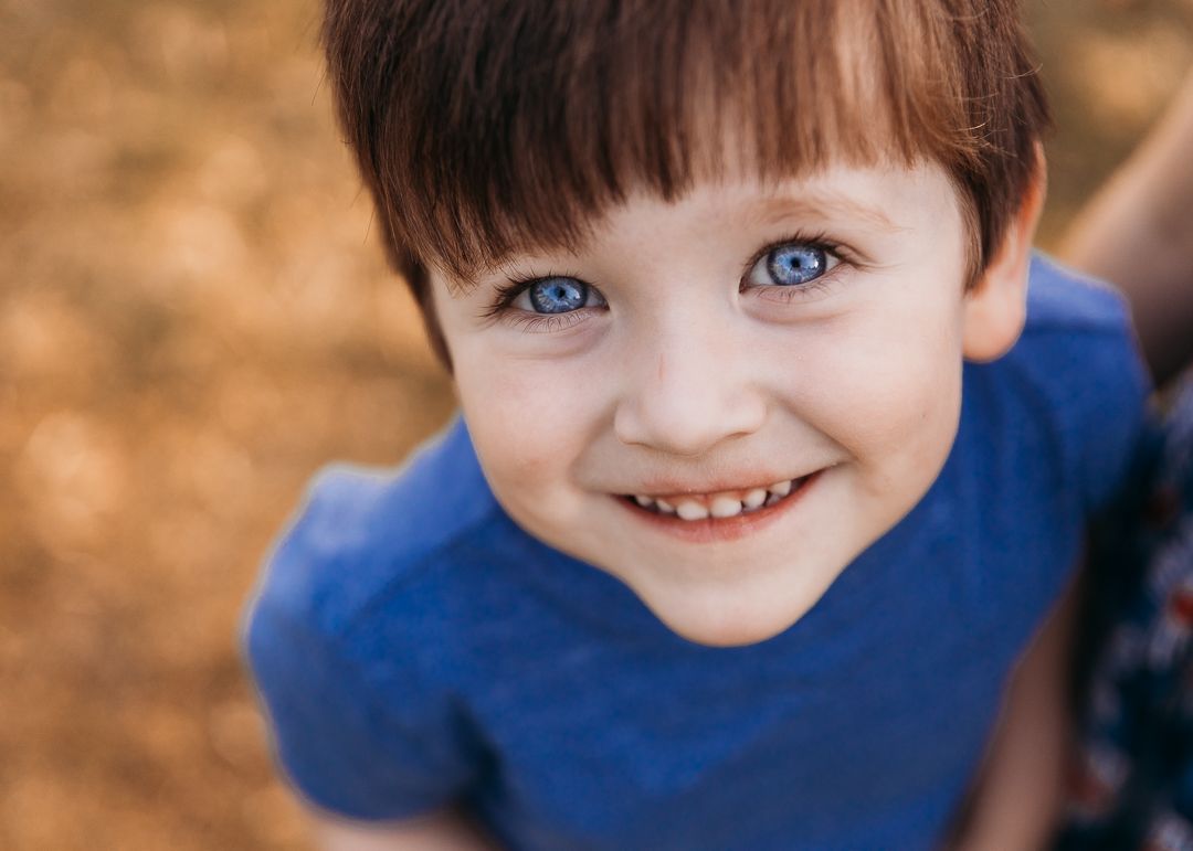 A sequence of close-up photos showing bright blue eyes and joyful expressions in a warm outdoor setting.