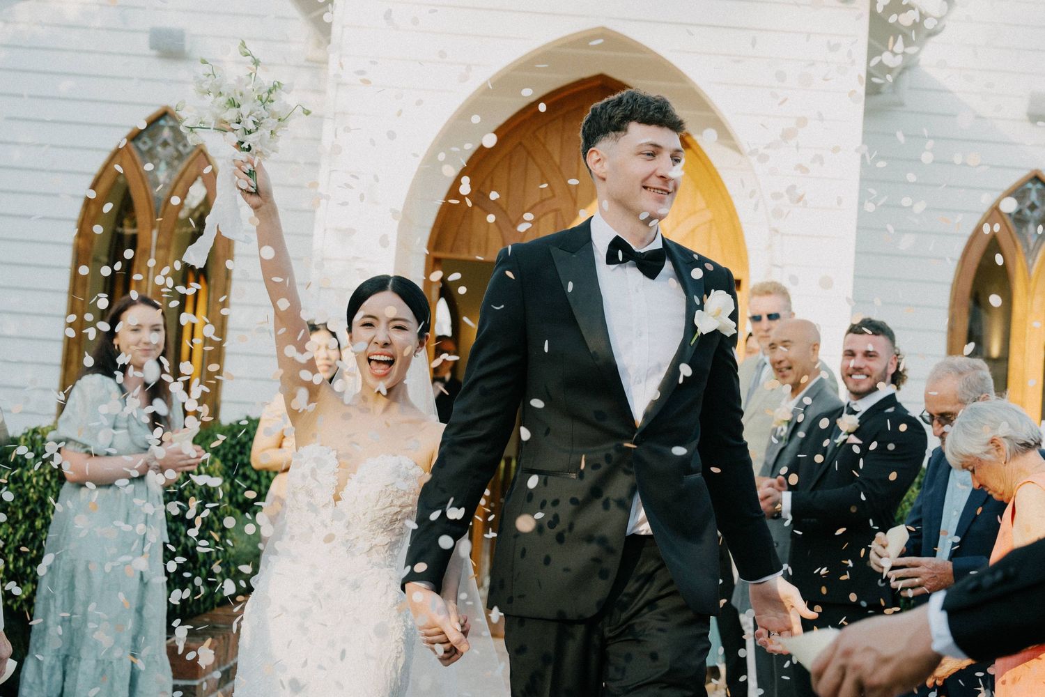 Australia’s best wedding photographer capturing wedding exit with confetti in The valley estate, Gold coast