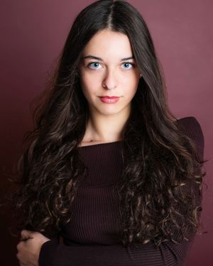 A series of studio portraits showing dark-haired woman in brown turtleneck sweater against burgundy background.