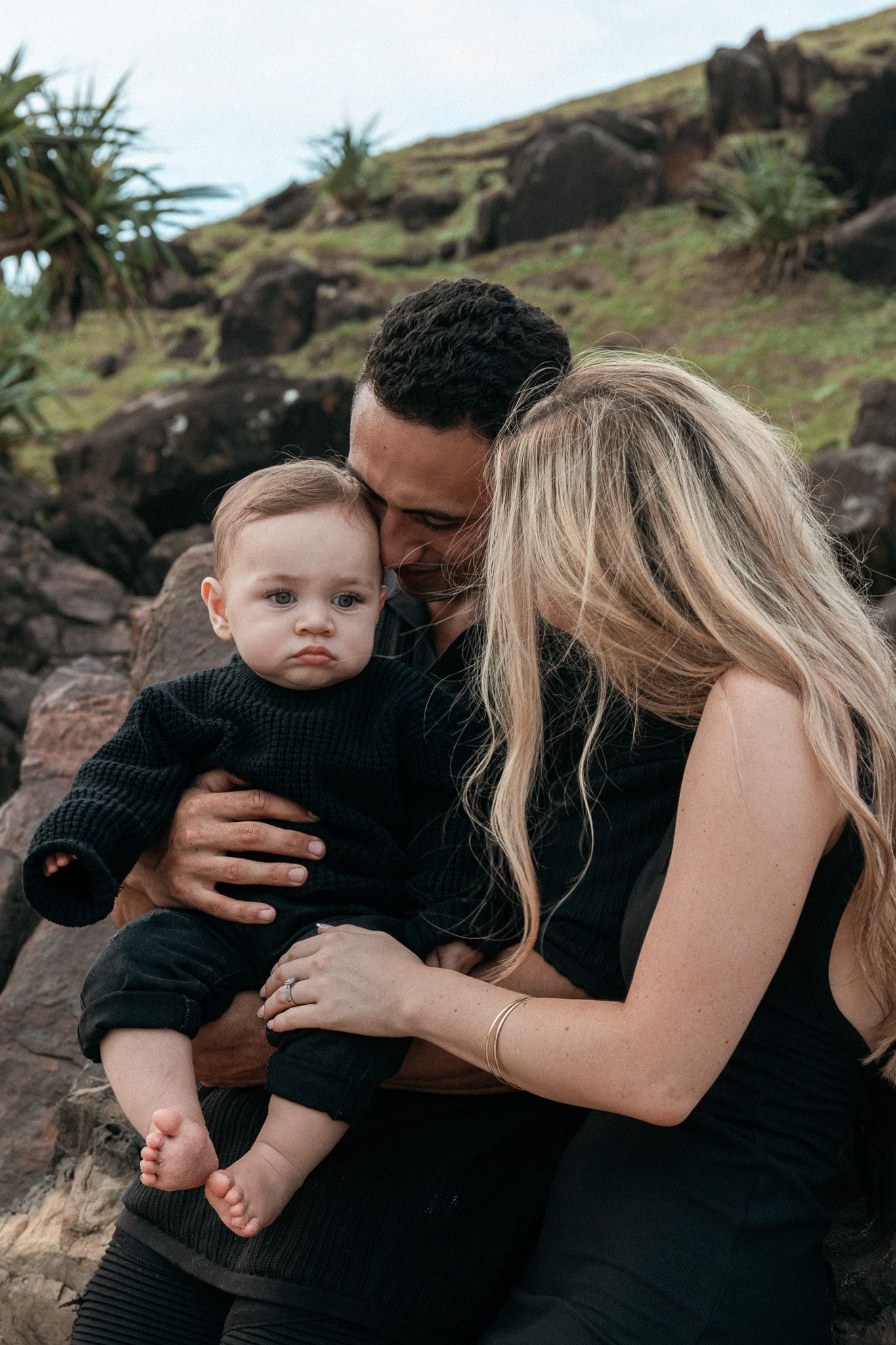 Joyful family photoshoot on Cabarita Headland with warm natural light and sea views