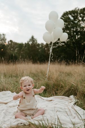 Melissa Stuer Photography Moederschapsfotograaf Moerbeke Oost-Vlaanderen kinderfotograaf jongen zonsopkomst cake smash eerste verjaardag