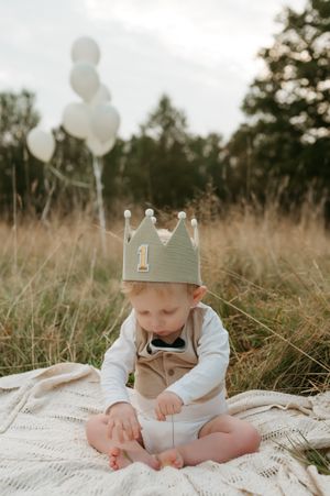 Melissa Stuer Photography Moederschapsfotograaf Moerbeke Oost-Vlaanderen kinderfotograaf jongen zonsopkomst cake smash eerste verjaardag