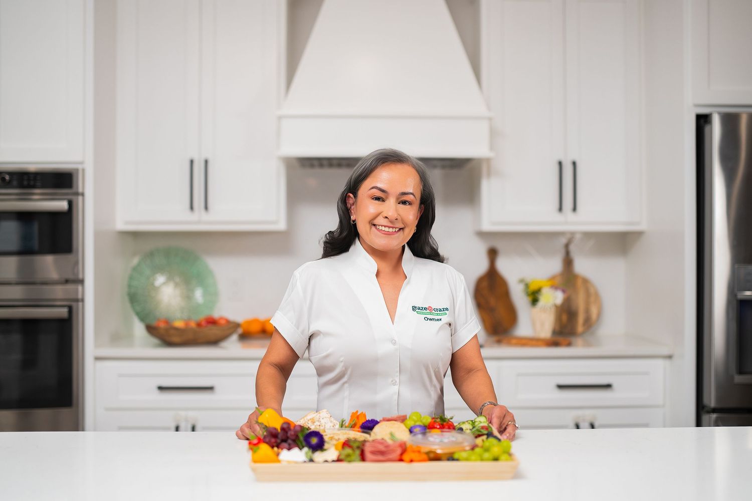 Orlando personal branding photographer Ray Alvarez — nutritionist lifestyle branding session on location in modern kitchen setting