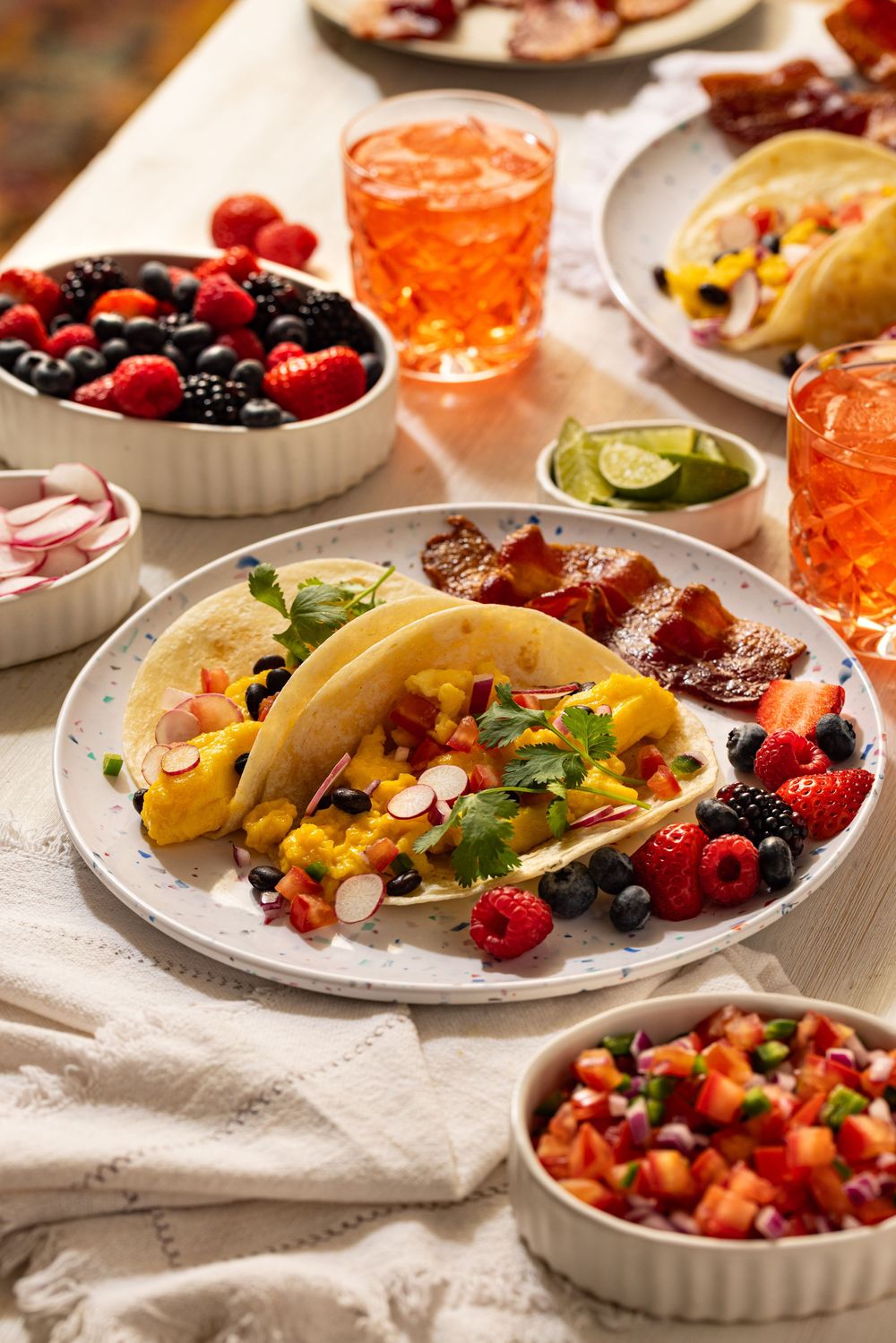 Breakfast tacos served with fresh fruit and juice captured by Los Angeles food and lifestyle photographer.