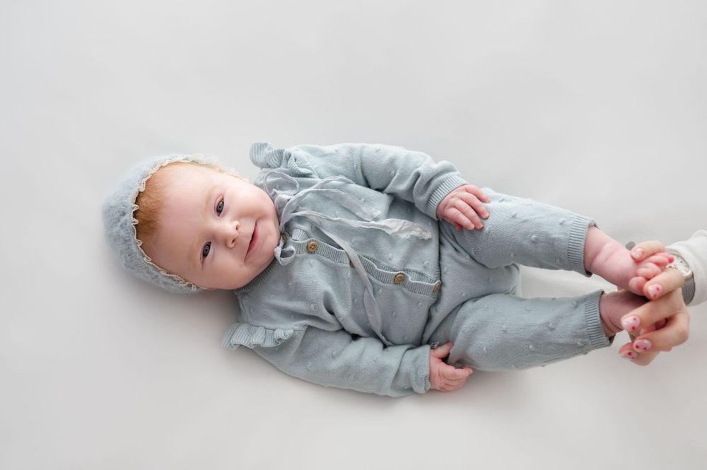 Milestone portrait of a joyful girl dressed in a cute outfit and smiling – Precious Twenty-One Photography