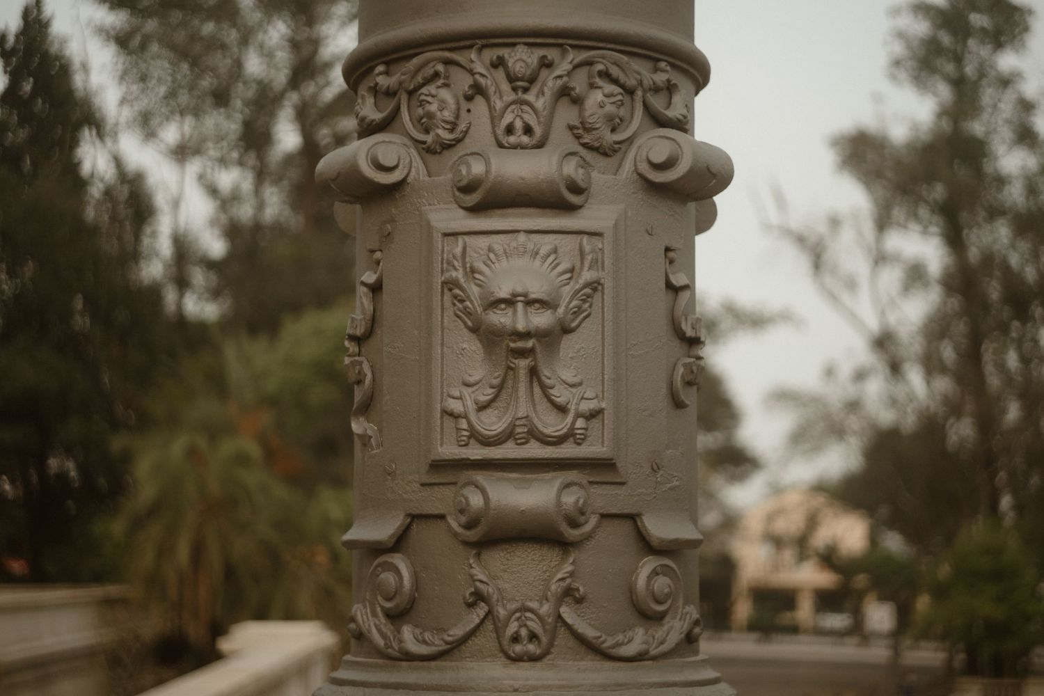 Detailed architectural stone carvings and decorative elements on building facade.
