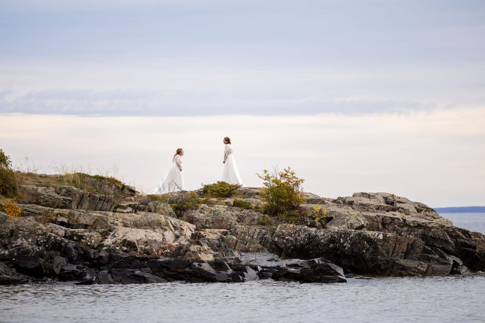 Wedding couple first look on the shores of Lake Superior