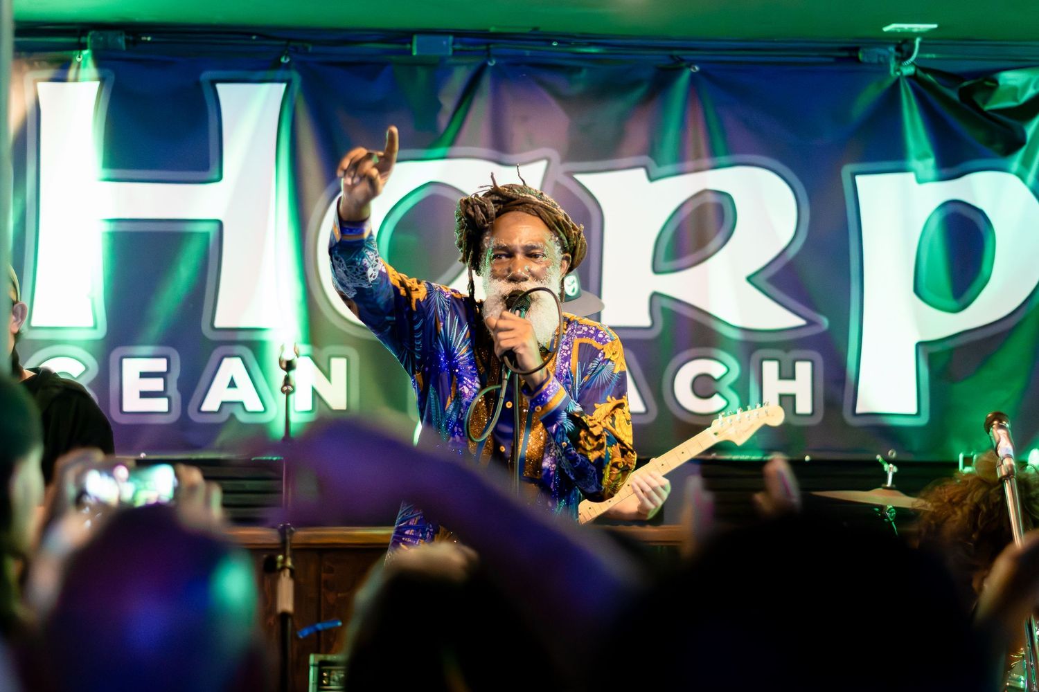 San Diego live music photography of reggae artist Don Carlos performing on stage at The Harp in Ocean Beach.
