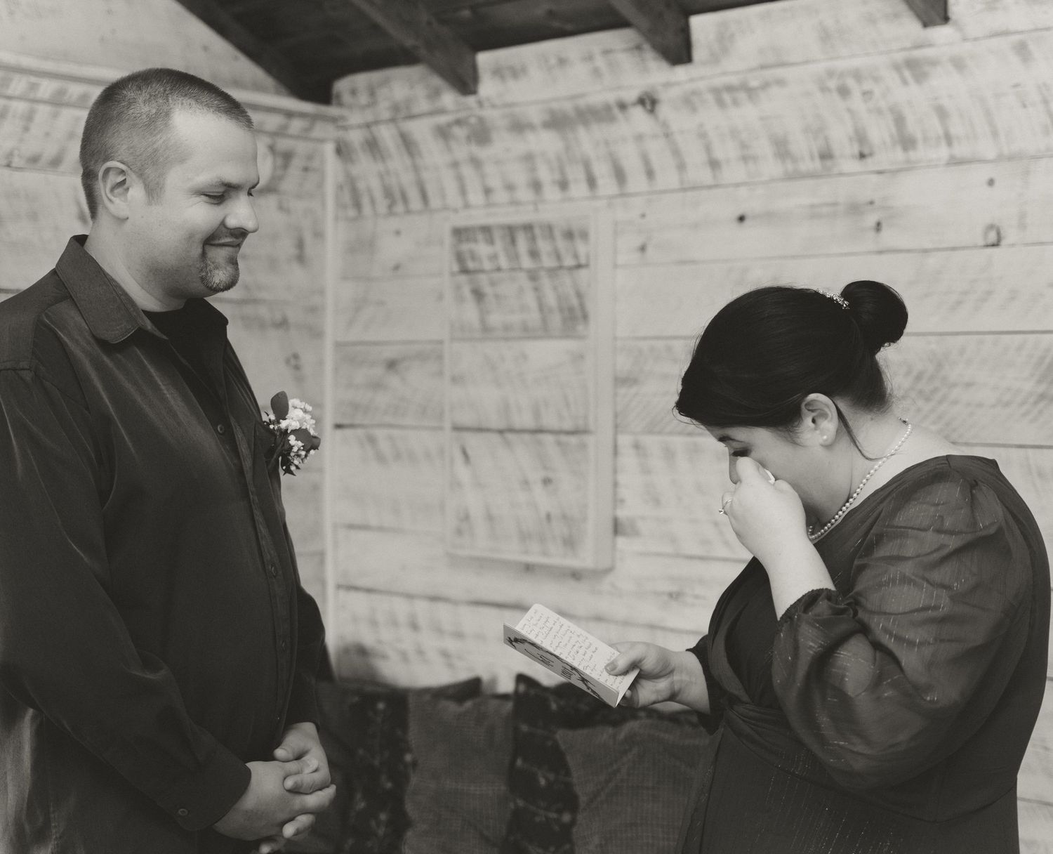 An emotional moment captured between two people during a ceremony.