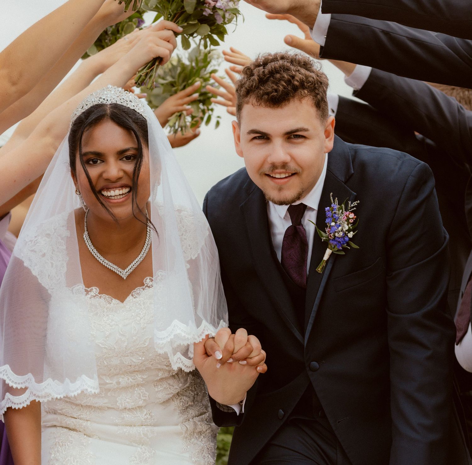 Newlyweds share a joyful moment together after their wedding ceremony.