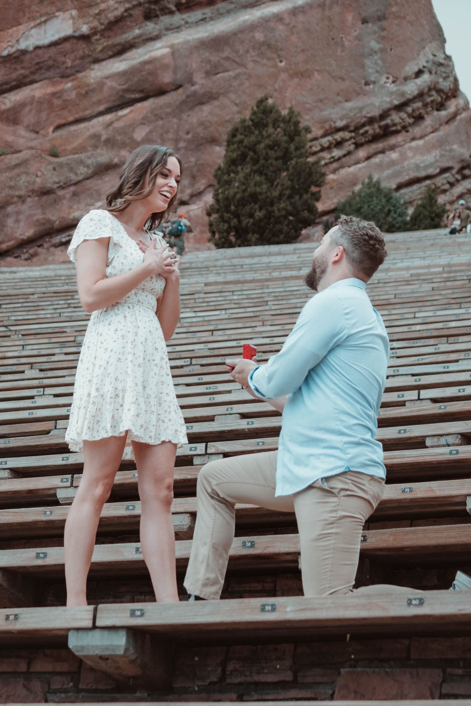 A surprise proposal on the iconic steps of Red Rocks Amphitheatre.