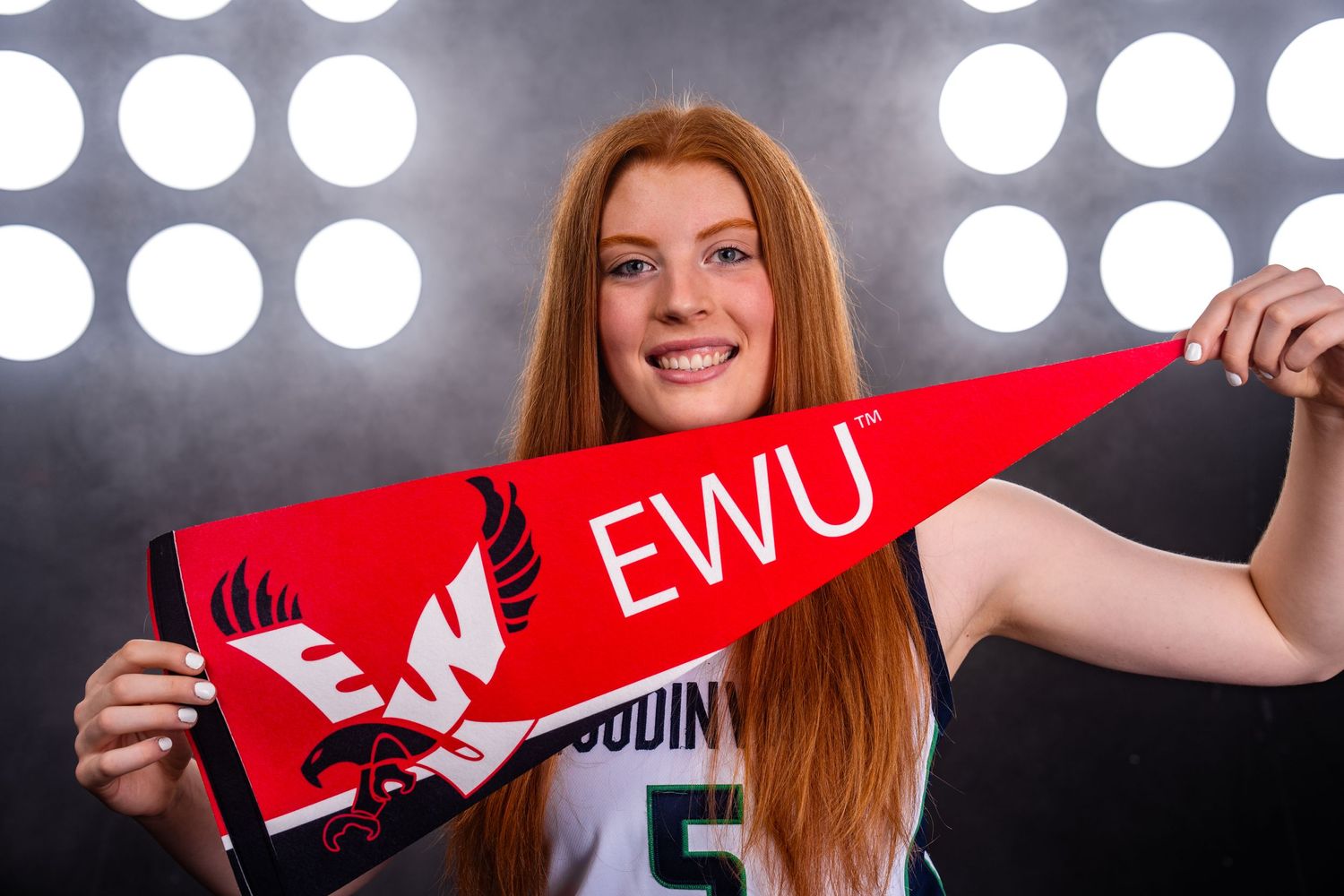 A women's basketball player from Woodinville High School committing to Easter Washington University basketball program.