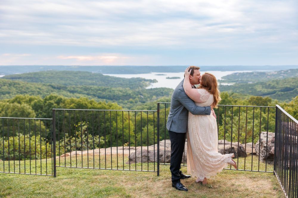 A couple getting engaged at top of the rock in Branson Missouri near big cedar lodge.