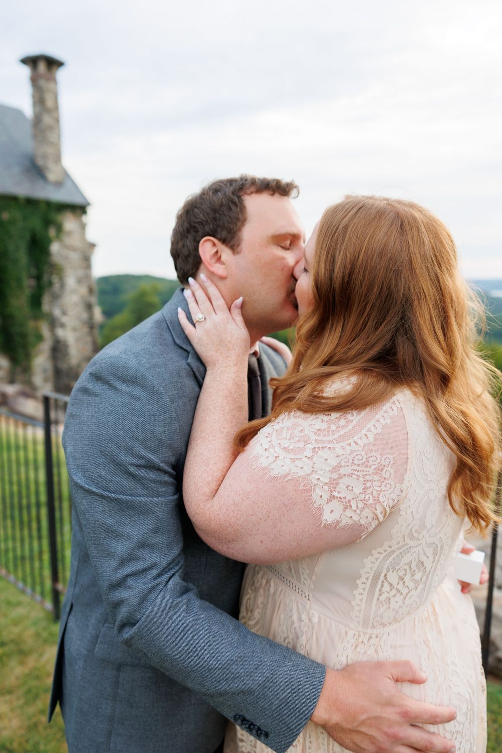 A couple kissing and getting engaged at Top of the Rock in Branson, MO.