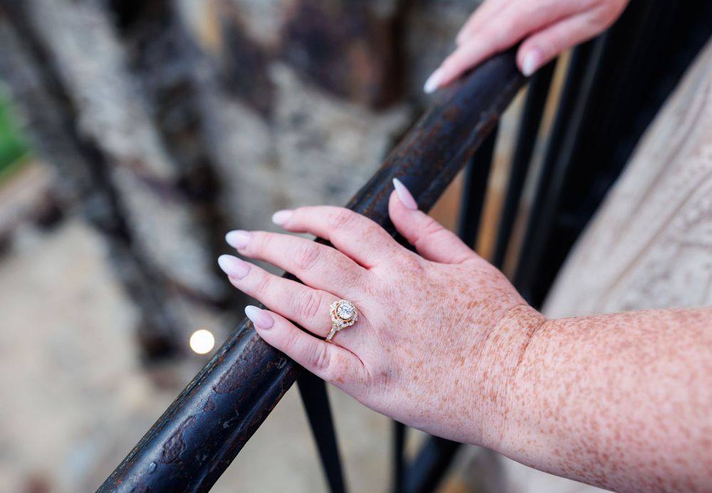 A couple getting engaged at top of the rock in Branson Missouri near big cedar lodge.