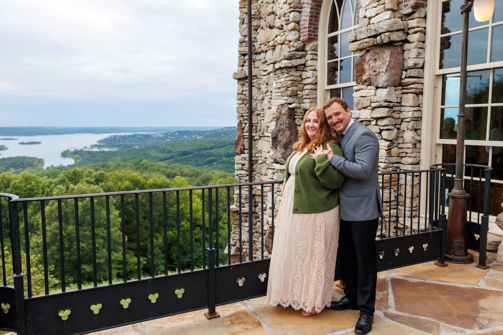 A couple getting engaged at top of the rock in Branson Missouri near big cedar lodge.