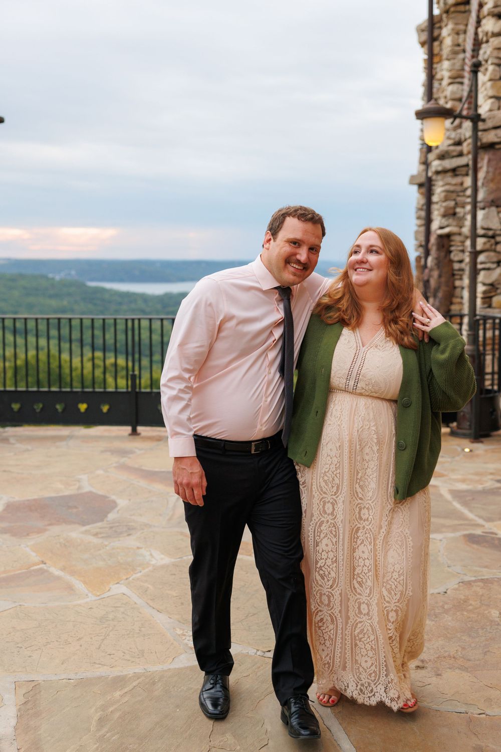 A couple getting engaged at top of the rock in Branson Missouri near big cedar lodge.