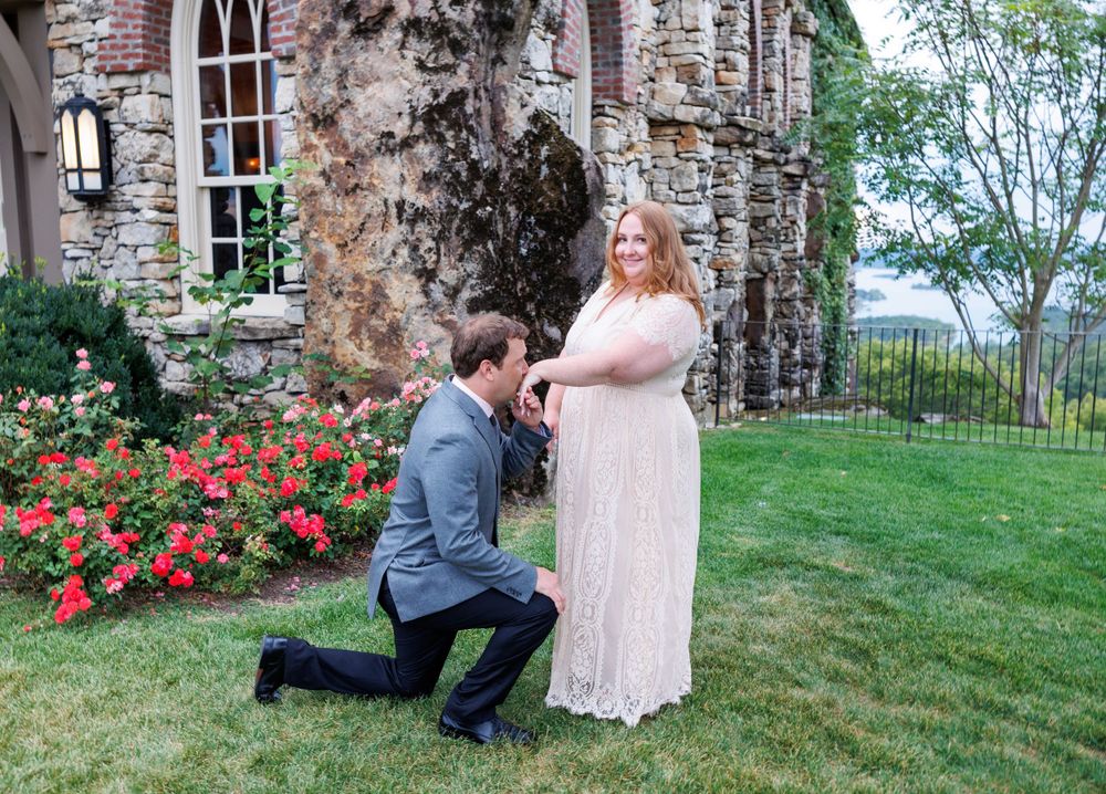 A couple getting engaged at top of the rock in Branson Missouri near big cedar lodge.